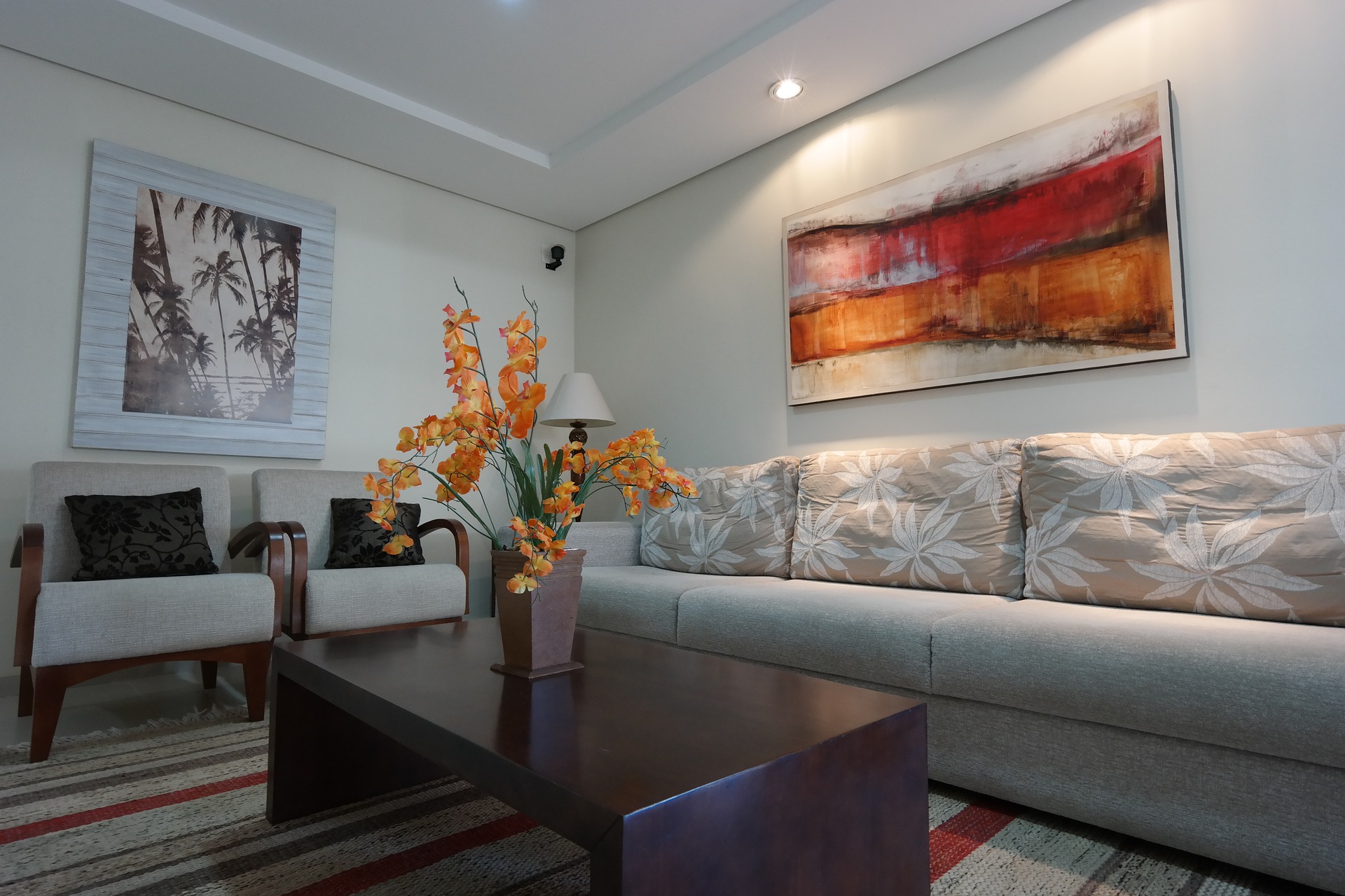 Living Room w wooden coffee table & flower