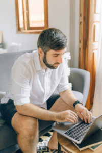 Man in white shirt WFH 4r