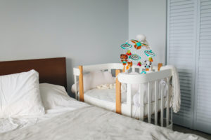 Baby Cot next to Bed